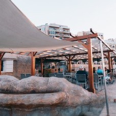People enjoying Preluna Beach Club Restaurant