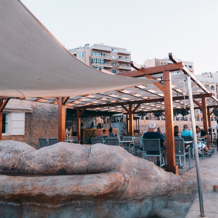 People enjoying Preluna Beach Club Restaurant