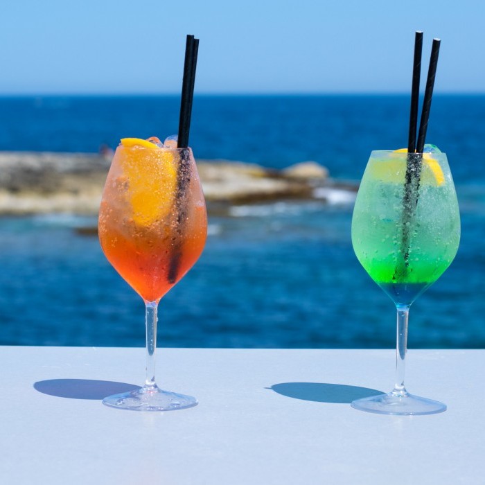 Two refreshing cocktails with an amazing seaview
