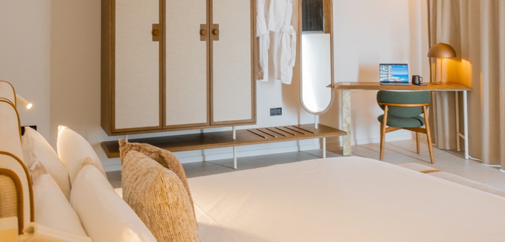 Double bedroom with private sea view balcony in the Sea View Suite