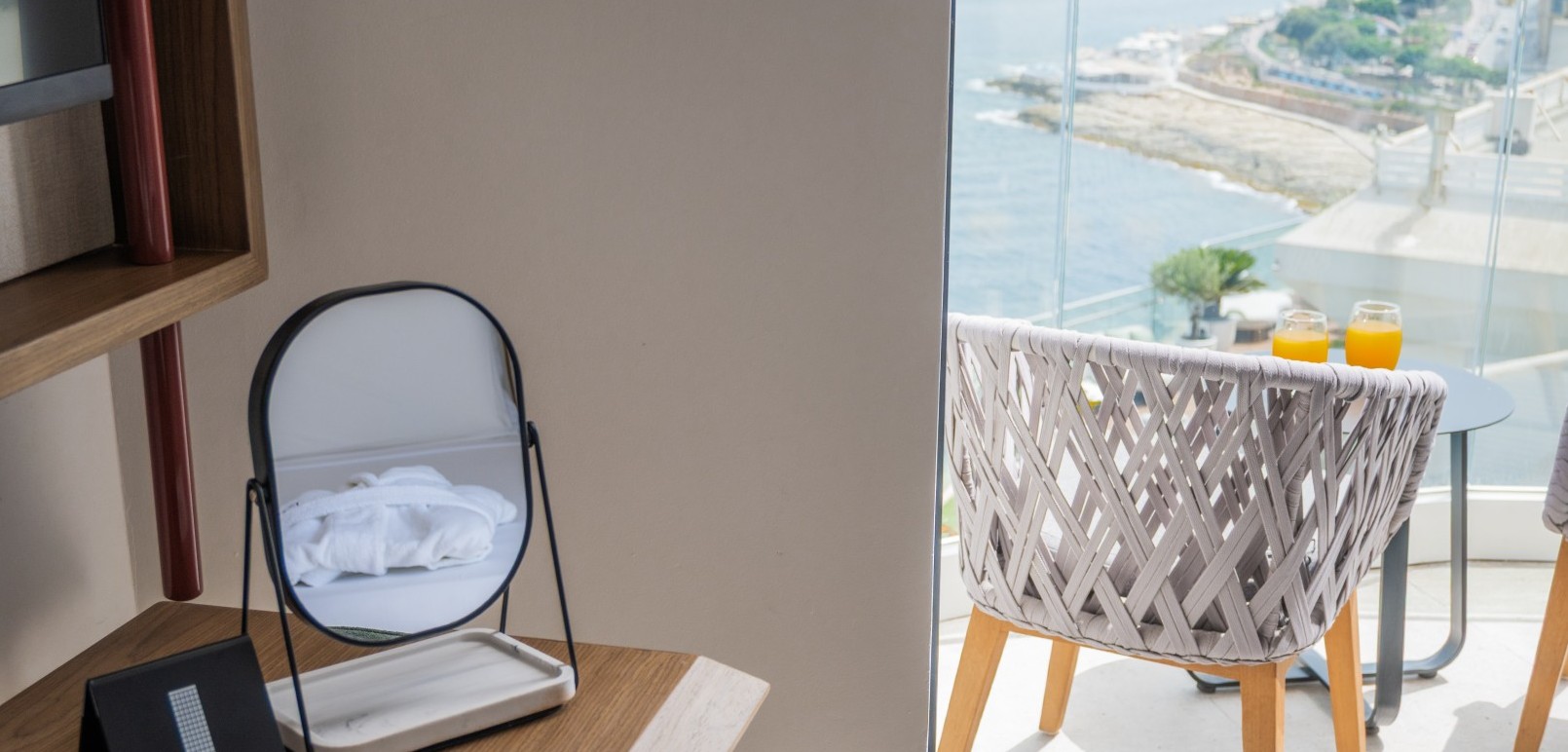 Sea View Suite bedroom with private balcony and Mediterranean sea view