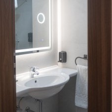 Bathroom in a Sea View Room at The Preluna Hotel