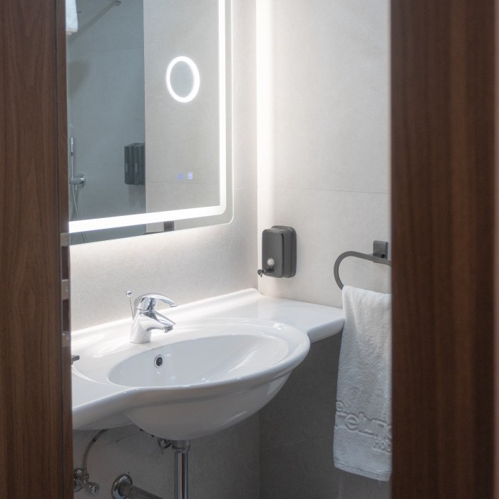 Bathroom in a Sea View Room at The Preluna Hotel