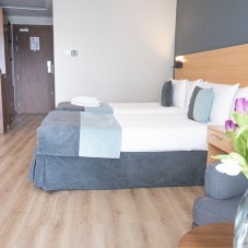 Bedrom Sea View Room at The Preluna Hotel