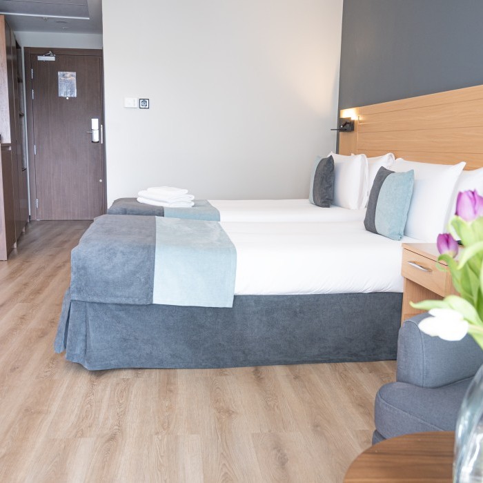 Bedrom Sea View Room at The Preluna Hotel