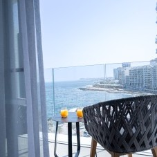 Private balcony with Mediterranean sea view from a Sea View Room